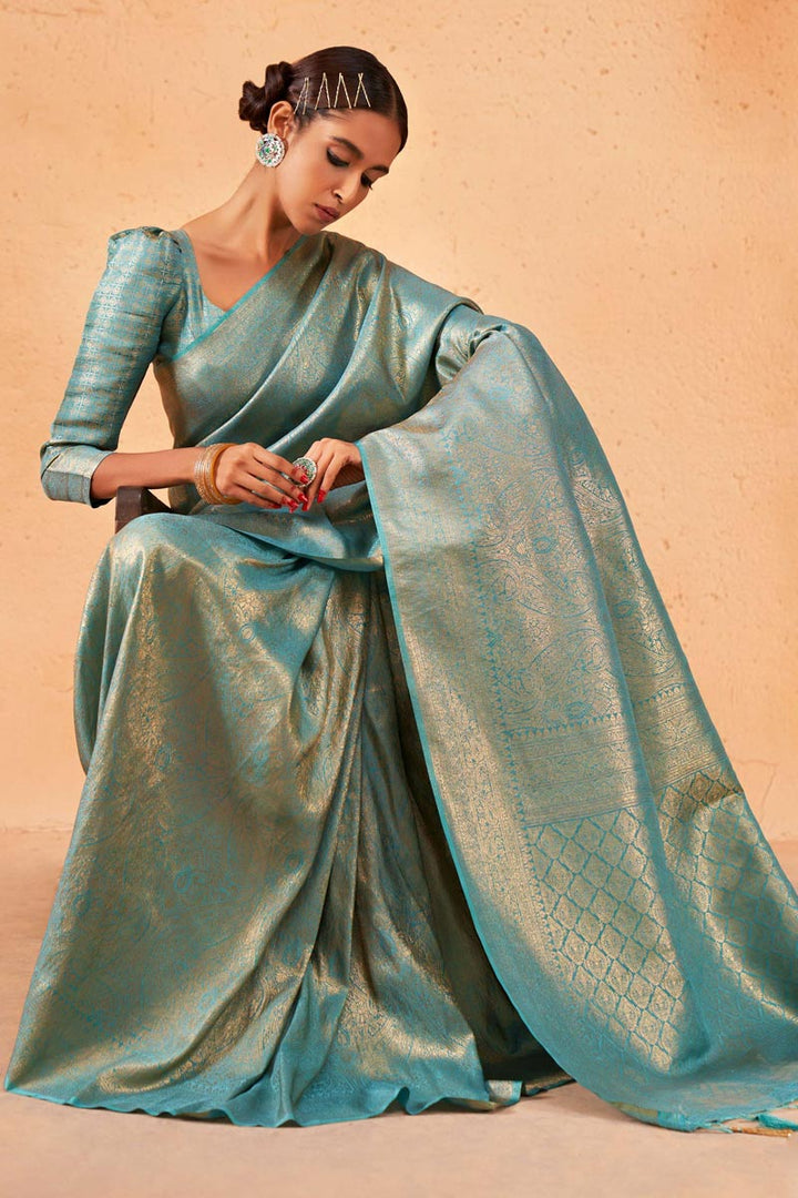 Beguiling Weaving Work On Cyan Color Kanjivaram Silk Saree