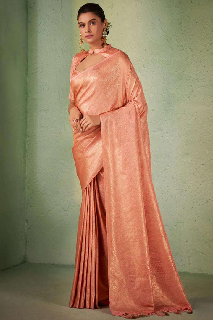 Engaging Kanjivaram Silk Peach Color Saree With Weaving Work