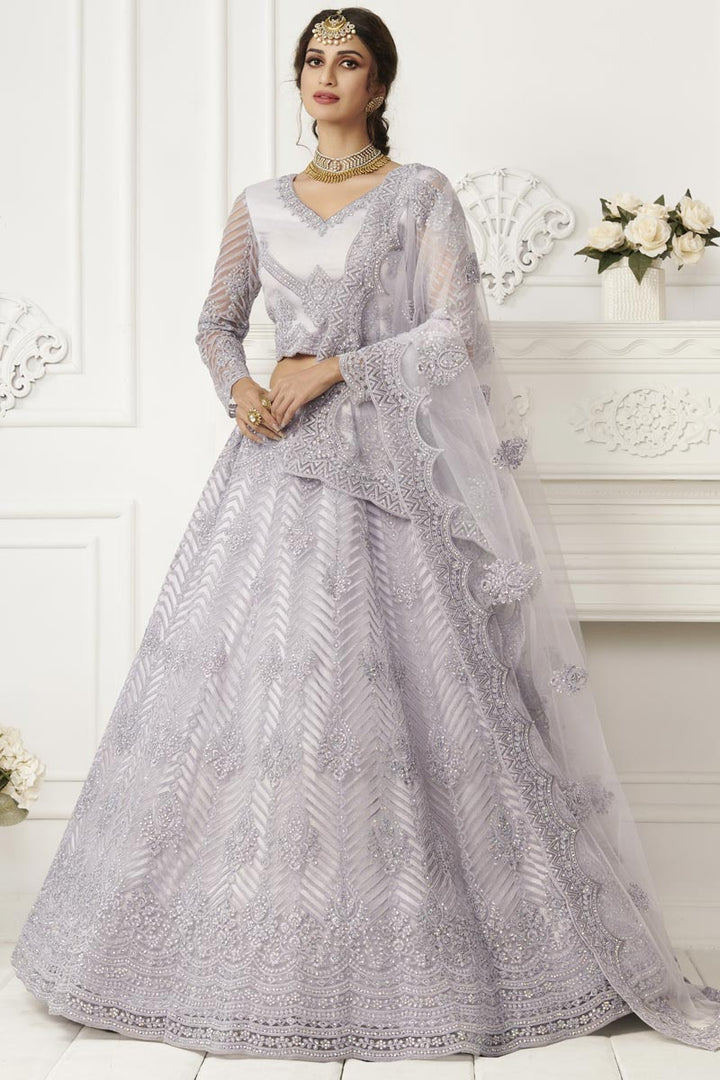 Lavender Color Stylish Reception Wear Lehenga Choli In Net Fabric