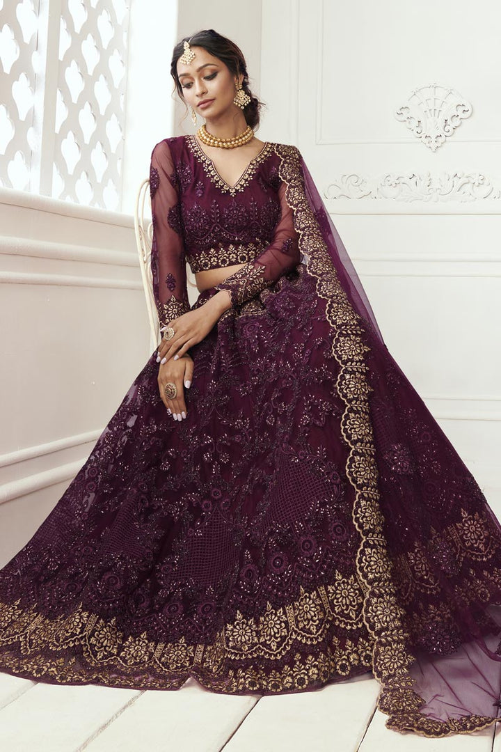 Trendy Sangeet Wear Lehenga Choli In Wine Color Net Fabric