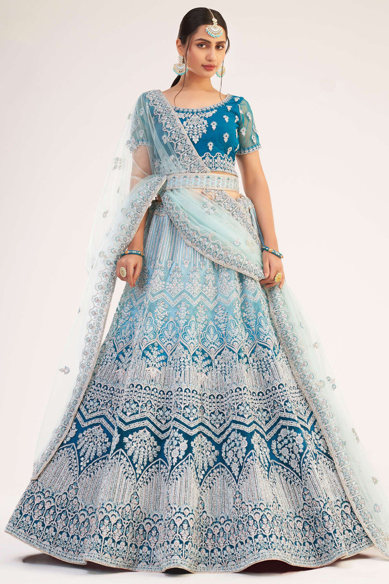 Net Fabric Cyan Color Glamorous Embroidered Wedding Wear Lehenga Choli