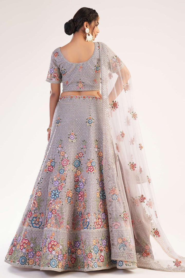 Net Attractive Embroidered Wedding Wear Lehenga Choli In Lavender Color