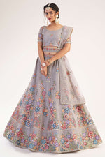 Load image into Gallery viewer, Net Attractive Embroidered Wedding Wear Lehenga Choli In Lavender Color
