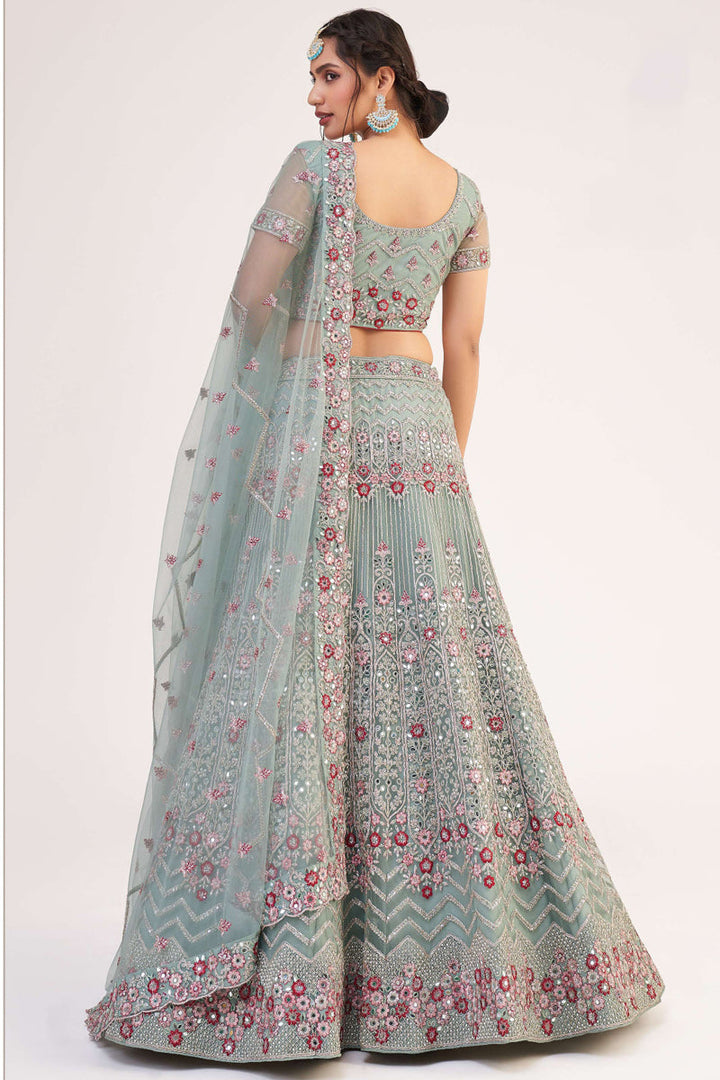 Majestic Light Cyan Net Embroidered Wedding Wear Lehenga Choli