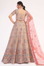 Load image into Gallery viewer, Peach Net Magnificent Embroidered Wedding Lehenga Choli
