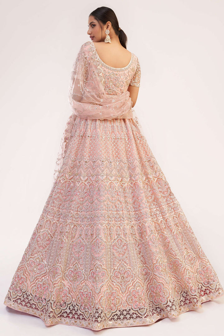 Stunning Pink Net Fabric Embroidered Wedding Wear Lehenga Choli