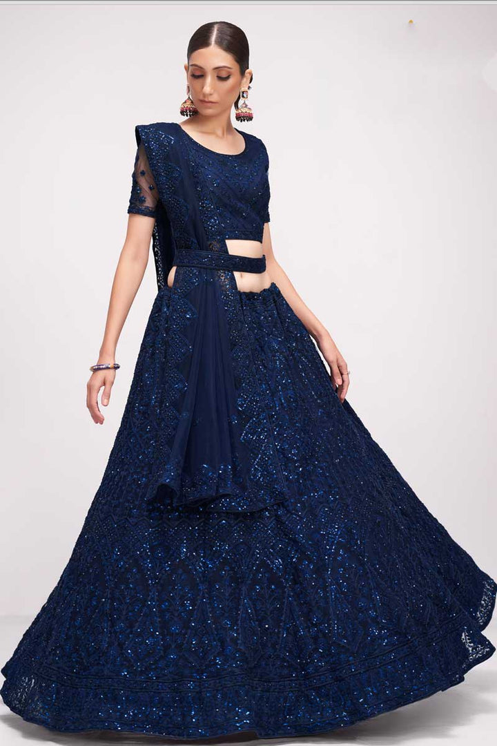 Tempting Net Fabric Blue Color Lehenga With Embroidered Work