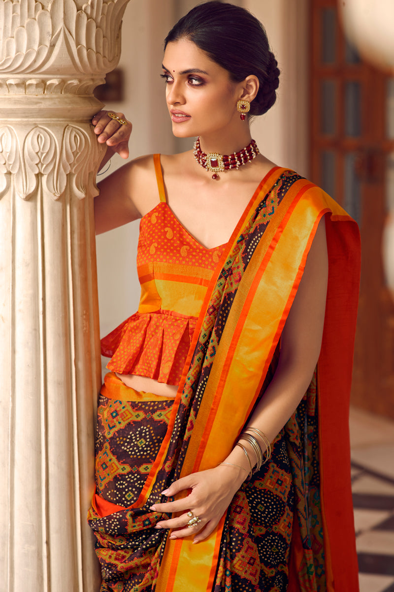 Fancy Brasso Fabric Puja Wear Orange Color Printed Saree