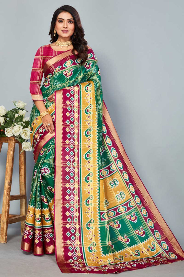 Green Color Engrossing Patola Printed Saree In Cotton Fabric