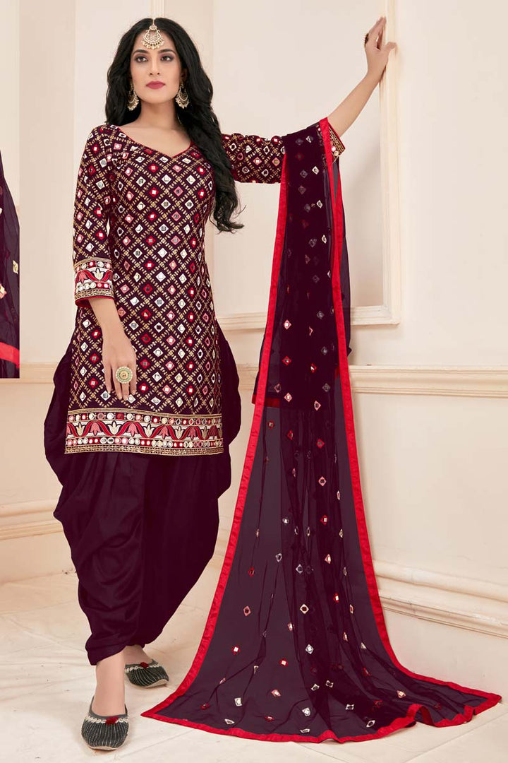 Beguiling Embroidered Work On Cotton Fabric Festival Wear Patiala Suit In Wine Color
