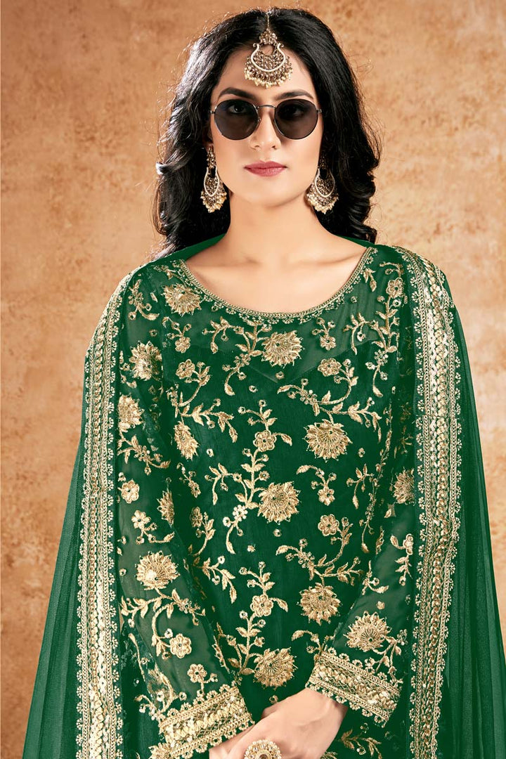 Remarkable Embroidered Work On Green Color Function Wear Sharara Suit In Net Fabric