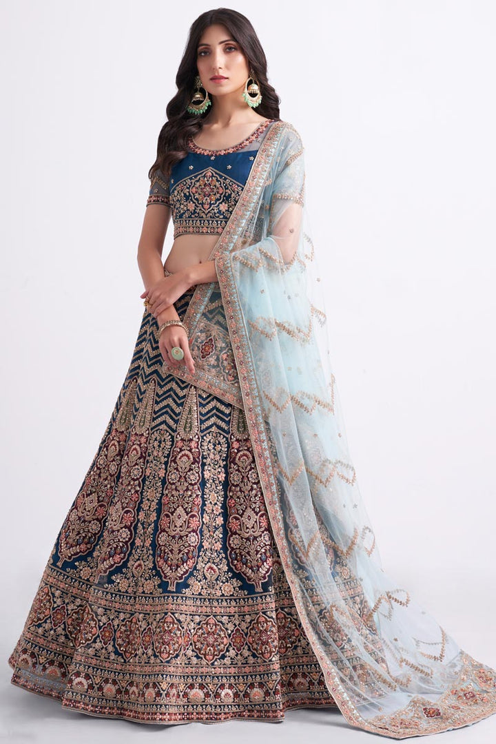 Blue Color Enticing Wedding Style Bridal Net Fabric Lehenga