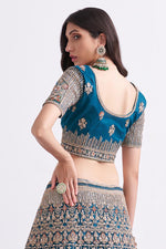 Load image into Gallery viewer, Blue Color Enticing Wedding Style Bridal Lehenga In Net Fabric
