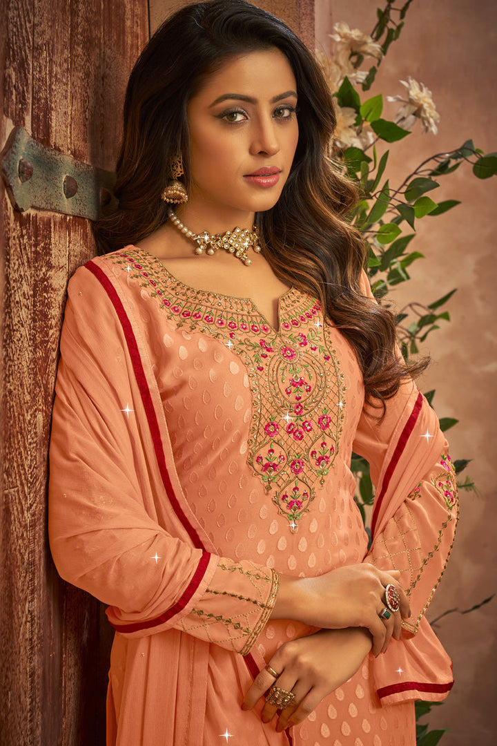Brasso Fabric Festive Wear Lovely Palazzo Suit In Peach Color