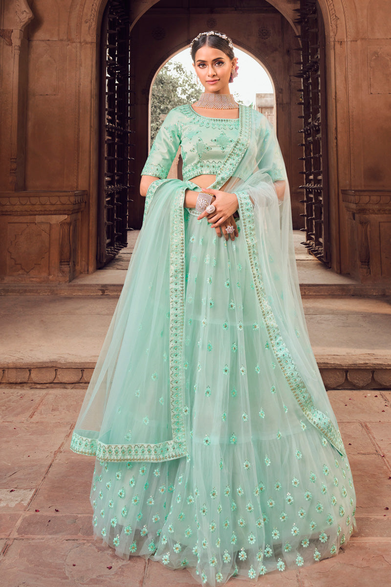 Sea Green Color Embroidered Net Fabric Tempting Lehenga