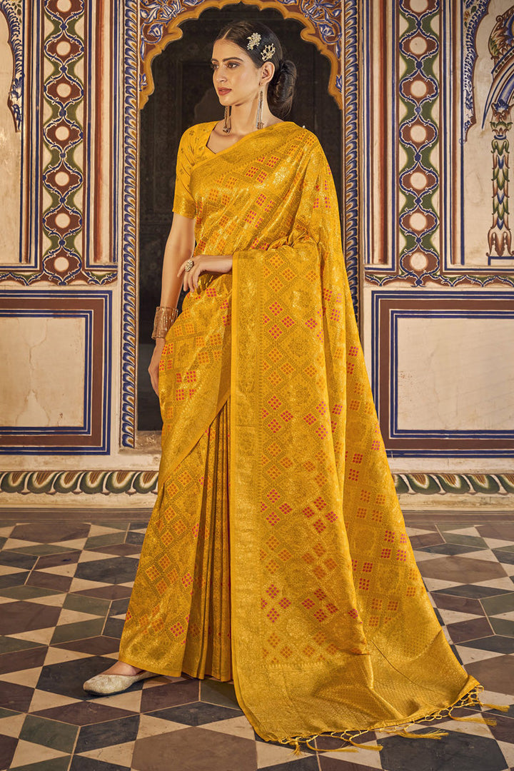 Engaging Mustard Color Chinon Fabric Bandhani Printed Saree