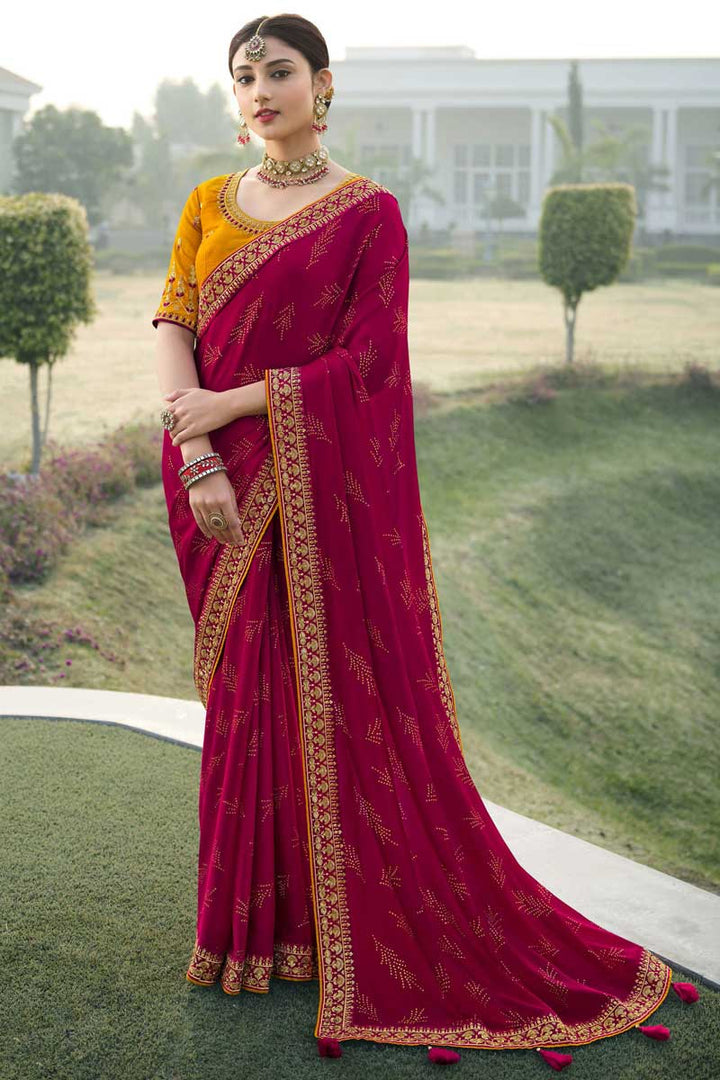Fascinating Sequins Work On Rani Color Sangeet Wear Saree In Satin Chiffon Fabric