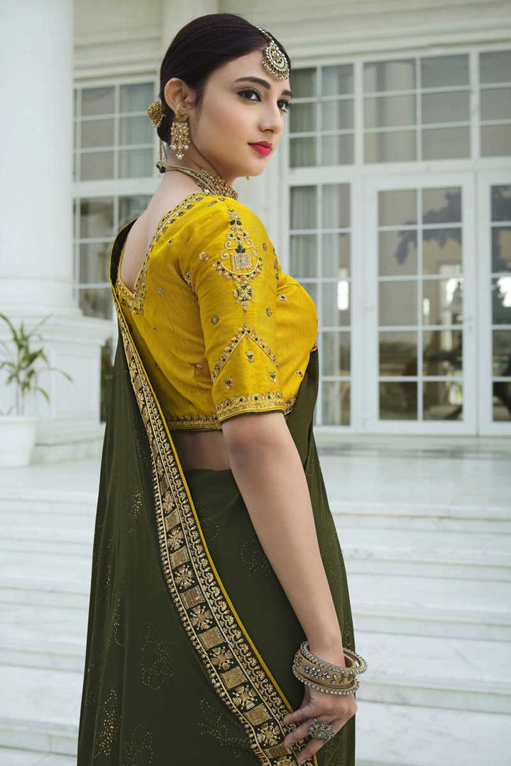 Sequins Work On Mehendi Green Color Tempting Sangeet Wear Saree In Satin Chiffon Fabric