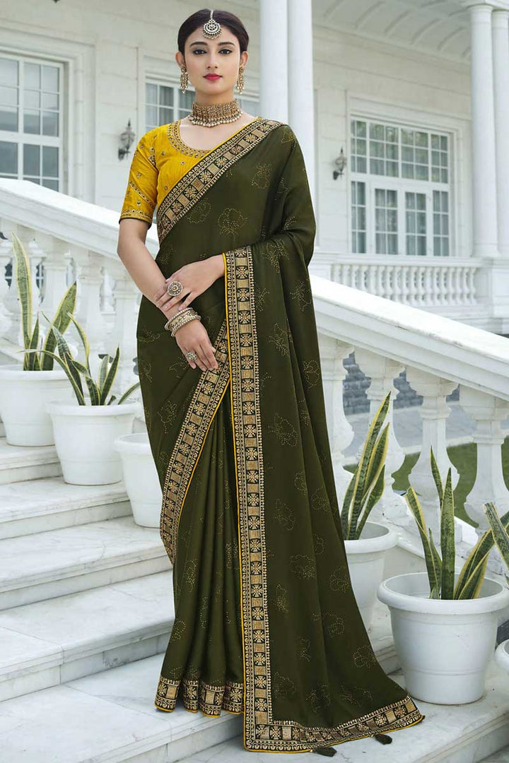 Sequins Work On Mehendi Green Color Tempting Sangeet Wear Saree In Satin Chiffon Fabric