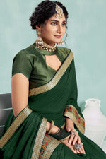 Load image into Gallery viewer, Art Silk Fabric Dark Green Color Festival Wear Saree With Fascinating Border Work
