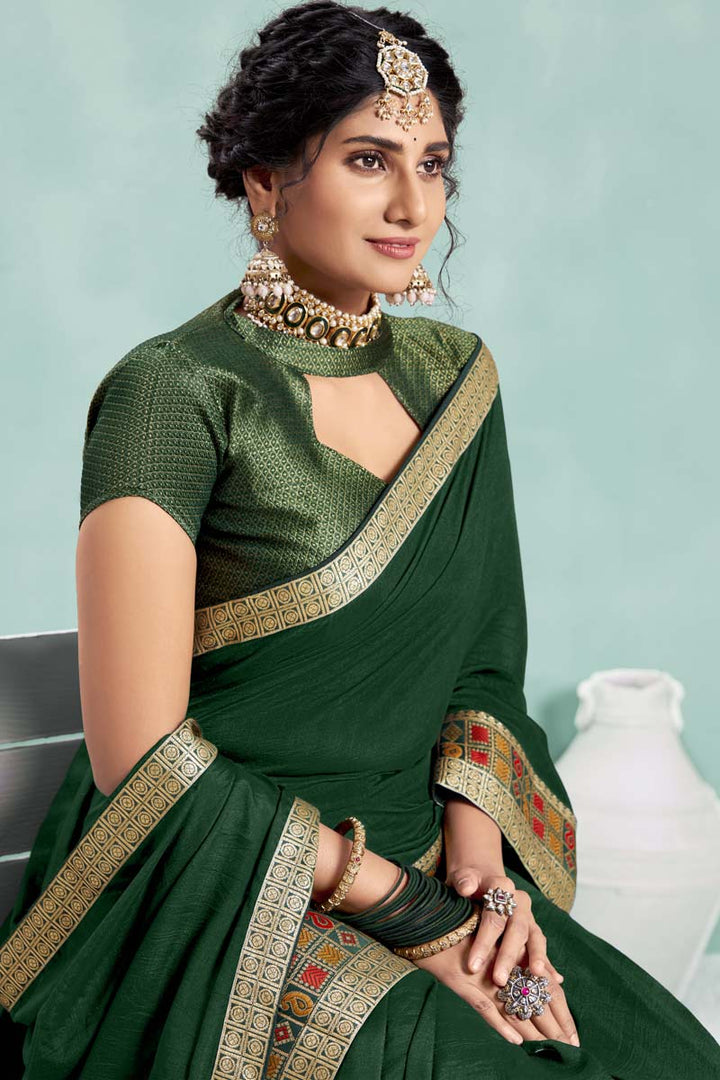Art Silk Fabric Dark Green Color Festival Wear Saree With Fascinating Border Work