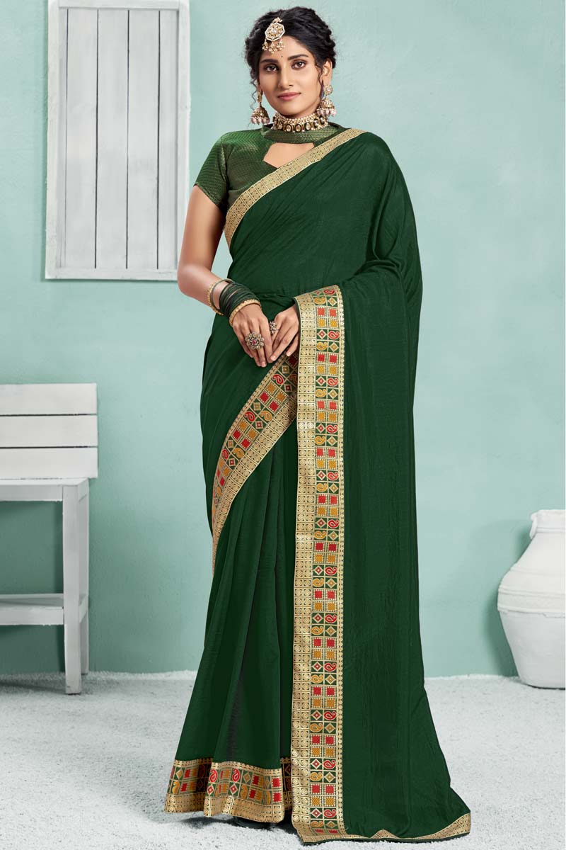Art Silk Fabric Dark Green Color Festival Wear Saree With Fascinating Border Work
