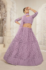 Load image into Gallery viewer, Creative Embroidered Work On Designer Lehenga In Lavender Color Net Fabric