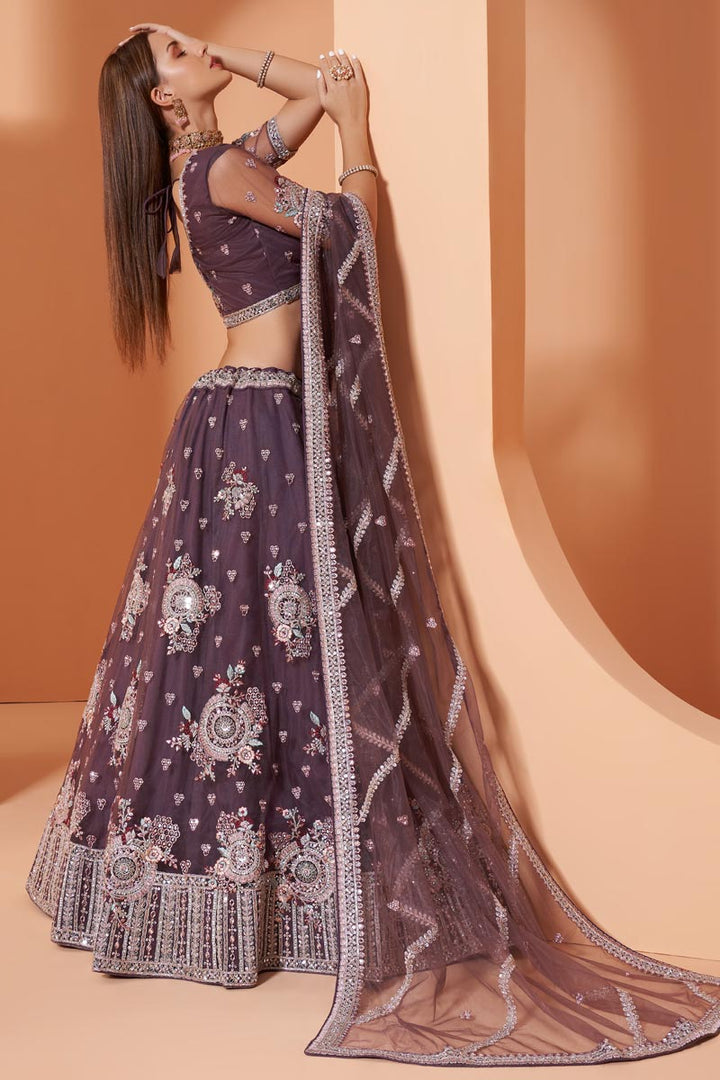 Wine Color Wedding Function Wear Embroidered Lehenga In Net Fabric