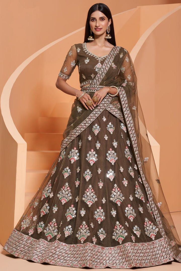 Wedding Function Wear Net Fabric Embroidered Lehenga Choli In Dark Beige Color