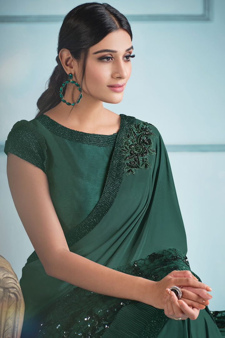 Lycra Fabric Party Style Engrossing Sequins Work Saree In Green Color