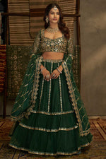 Load image into Gallery viewer, Tempting Net Fabric Off Green Color Lehenga With Sequins Work
