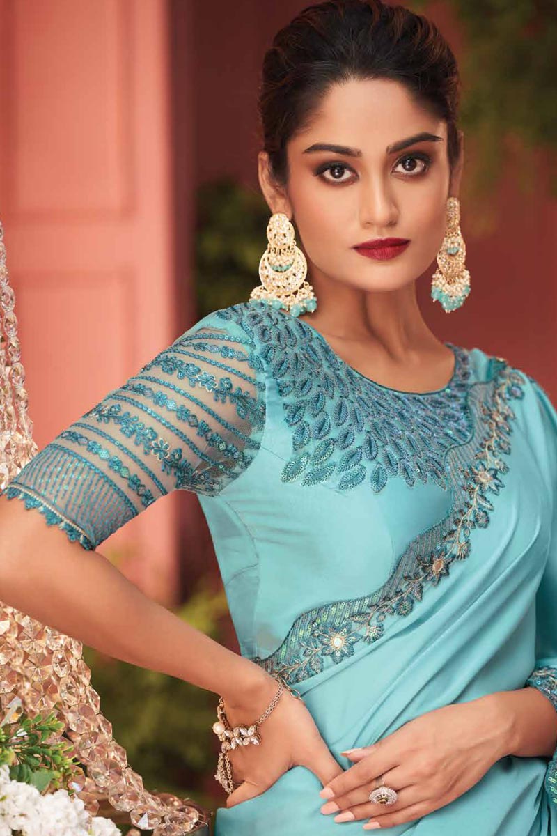 Cyan Color Fantastic Function Wear Border Work Georgette Fabric Saree