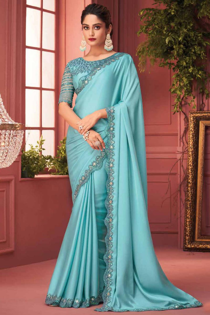 Cyan Color Fantastic Function Wear Border Work Georgette Fabric Saree