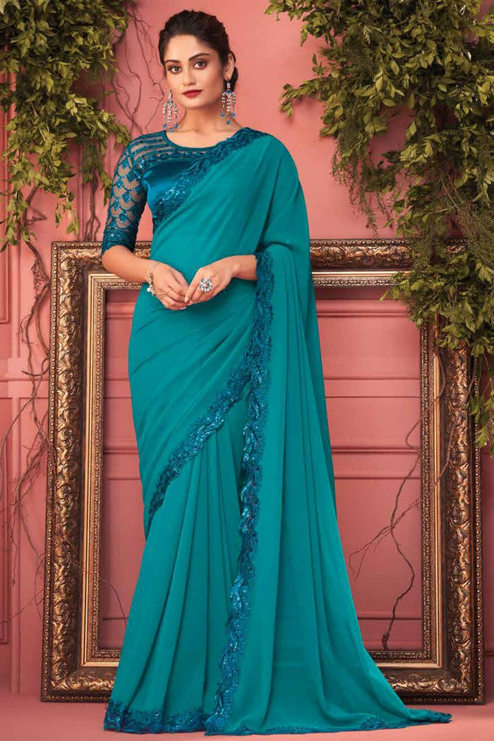 Teal Color Enticing Function Wear Border Work Georgette Fabric Saree