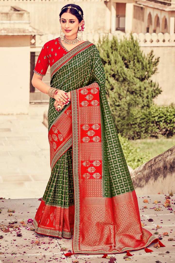 Dark Green Color Art Silk Fabric Saree With Ingenious Weaving Work
