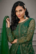 Load image into Gallery viewer, Lavish Embroidered Work On Net Fabric Dark Green Color Festival Wear Salwar Suit

