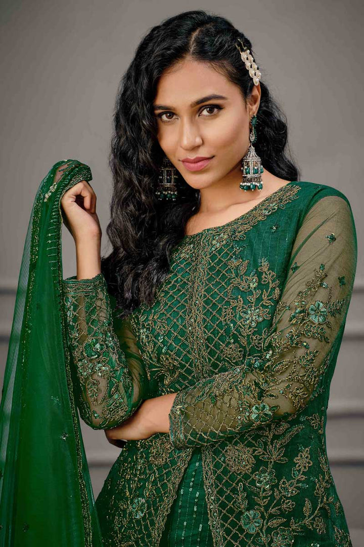 Lavish Embroidered Work On Net Fabric Dark Green Color Festival Wear Salwar Suit