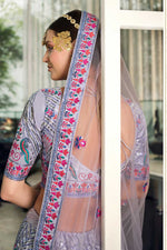 Load image into Gallery viewer, Riveting EmbroideLavender Silk Fabric  Wedding Wear Lehenga In Lavender Color
