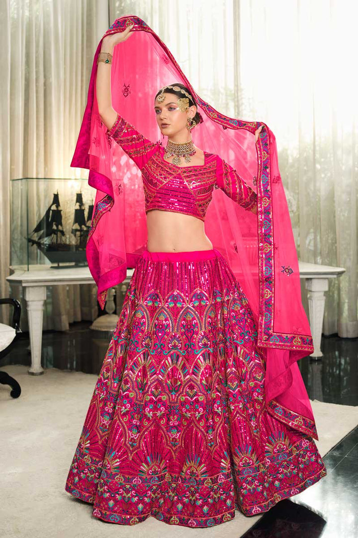 Rani Color Silk Fabric Precious EmbroideRani Wedding Wear Lehenga