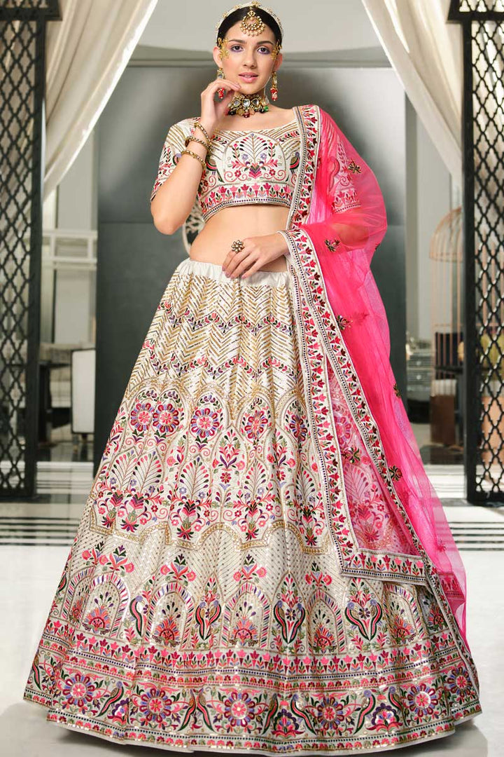 Off White Color Admirable EmbroideOff White Wedding Wear Lehenga In Silk Fabric