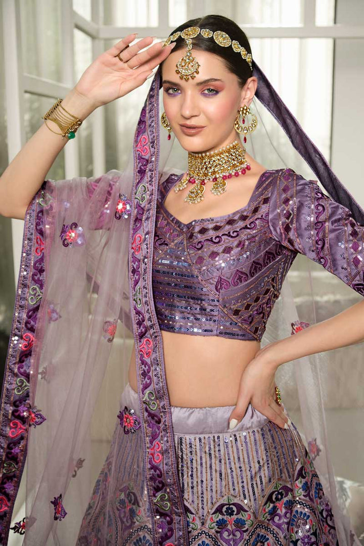 EmbroidePurple Purple Color Adorning Wedding Wear Lehenga In Silk Fabric