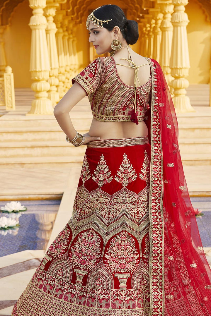 Velvet Fabric Wedding Wear Red Color Embroidered Lehenga Choli
