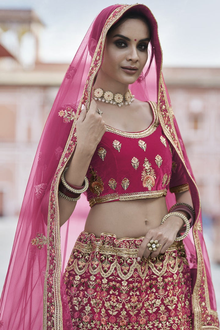 Designer Embroidered Wedding Wear Lehenga Choli In Pink Color Velvet Fabric