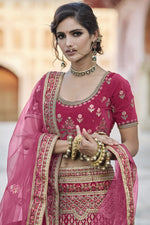 Load image into Gallery viewer, Pink Heavy Embroidered Wedding Wear Lehenga Choli In Velvet Fabric
