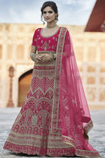 Load image into Gallery viewer, Pink Heavy Embroidered Wedding Wear Lehenga Choli In Velvet Fabric
