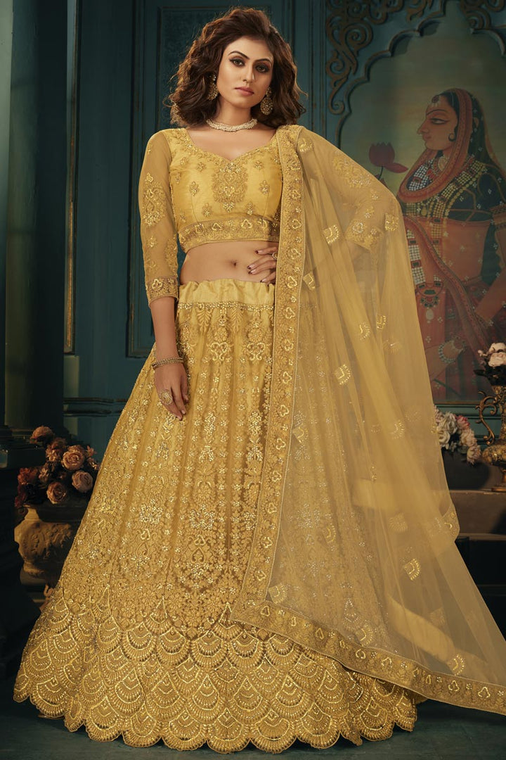 Net Fabric Embroidery Work Festive Wear Trendy Lehenga Choli In Yellow Color