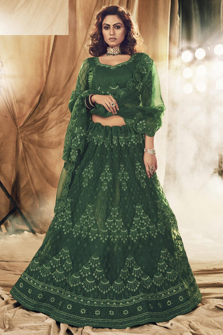 Net Fabric Festive Wear Trendy Lehenga Choli In Dark Green Color