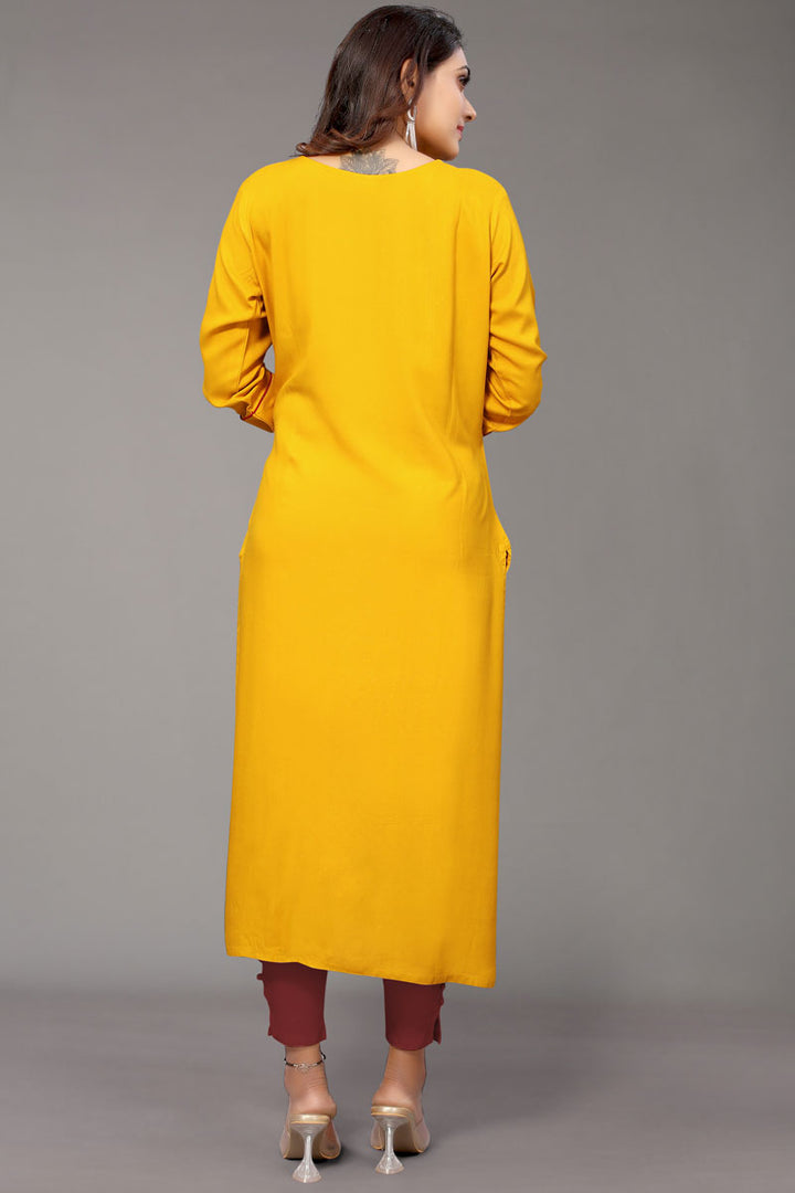 Alluring Mustard Color Rayon Fabric Embroidered Kurti