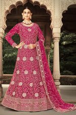 Load image into Gallery viewer, Fascinating Embroidered Work On Net Fabric Anarkali Suit In Rani Color
