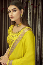 Load image into Gallery viewer, Intricate Chinon Fabric Party Wear Border Work Saree In Yellow Color
